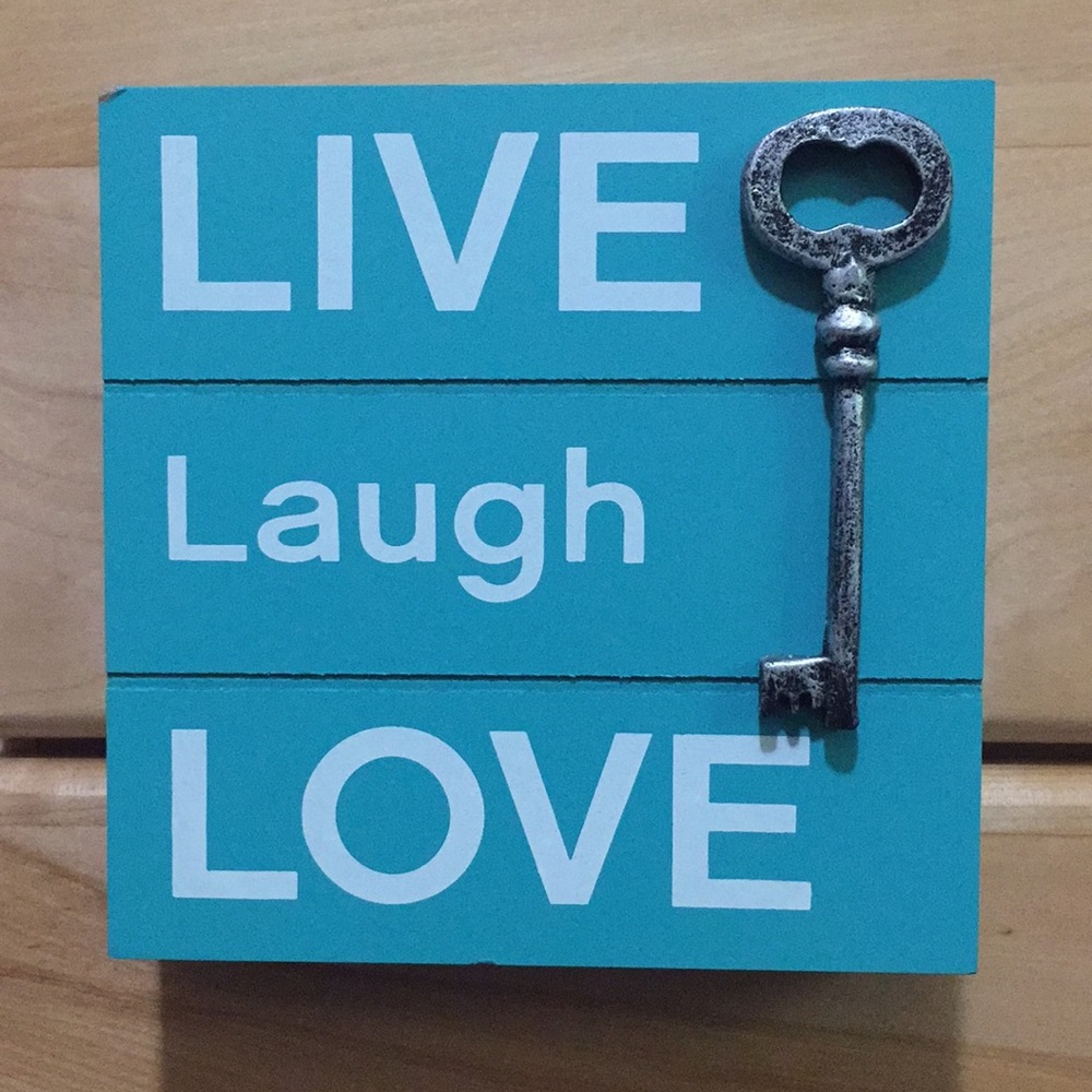 “Live Laugh Love” box sign